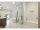 A modern bathroom equipped with a glass shower, soaking tub, and stylish tilework, offering comfort and sophistication at 3715 Peachtree Ne Rd # 2, Atlanta, GA 30319