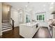 Modern kitchen with center island, stainless steel appliances, and bright natural light at 3715 Peachtree Ne Rd # 2, Atlanta, GA 30319