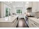 Modern kitchen with a spacious island, stainless appliances, and view of the garden at 3715 Peachtree Ne Rd # 2, Atlanta, GA 30319