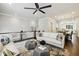 Spacious open-concept living room seamlessly connects to the dining area and kitchen at 3715 Peachtree Ne Rd # 2, Atlanta, GA 30319