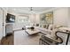 Inviting living room with large sectional sofa, stylish decor, and flat-screen TV for cozy relaxation at 3715 Peachtree Ne Rd # 2, Atlanta, GA 30319