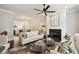 Open-concept living room with fireplace flowing into the dining area and kitchen at 3715 Peachtree Ne Rd # 2, Atlanta, GA 30319