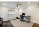 Stylish office with hardwood floors, large window, ceiling fan and desk at 3715 Peachtree Ne Rd # 2, Atlanta, GA 30319