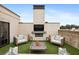 Rooftop terrace showcasing outdoor fireplace, multiple seating areas and beautiful views of the city at 3715 Peachtree Ne Rd # 2, Atlanta, GA 30319