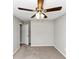 Bedroom with ceiling fan, neutral carpet, and a window at 5508 Hadrian Ct, Lithonia, GA 30058