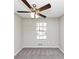 Bedroom with ceiling fan, neutral carpet, and a window at 5508 Hadrian Ct, Lithonia, GA 30058