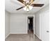Bedroom with ceiling fan, neutral carpet, and a window at 5508 Hadrian Ct, Lithonia, GA 30058