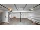 Spacious garage with overhead lighting and a utility sink at 5508 Hadrian Ct, Lithonia, GA 30058