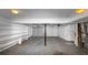Spacious garage featuring shelving and two garage doors at 5508 Hadrian Ct, Lithonia, GA 30058