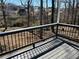 Private back deck with a view of wooded area, offering a serene outdoor space at 601 Brass Key Ct, Lawrenceville, GA 30046