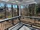 Private back deck with a view of wooded area, offering a serene outdoor space at 601 Brass Key Ct, Lawrenceville, GA 30046