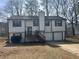 Charming two-story home with attached garage and well-maintained yard at 601 Brass Key Ct, Lawrenceville, GA 30046
