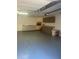 Spacious garage with plenty of storage cabinets and ample room for vehicles and projects at 601 Brass Key Ct, Lawrenceville, GA 30046