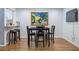 Inviting dining area with a table and bar seating, perfect for entertaining guests at 1901 Cumberland Ct, Smyrna, GA 30080