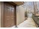 Charming front door with visible house number, complemented by a walkway and landscaped steps at 1901 Cumberland Ct, Smyrna, GA 30080