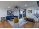 Comfortable living room featuring stylish furniture, modern decor, and access to a balcony at 1901 Cumberland Ct, Smyrna, GA 30080