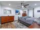Main bedroom features recessed lighting, a ceiling fan, neutral walls, dresser, and a comfortable metal bed frame at 1901 Cumberland Ct, Smyrna, GA 30080
