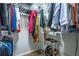 Spacious walk-in closet with ample hanging space, shelving, and room for storage at 1901 Cumberland Ct, Smyrna, GA 30080