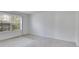 Bright bedroom with large window and plush carpet, ready for personalization at 2135 N Forest Trl, Dunwoody, GA 30338