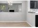 A view of dining room area showing kitchen and hardwood floors at 2135 N Forest Trl, Dunwoody, GA 30338