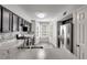 Updated kitchen with stainless steel appliances, marble counters and modern finishes at 2135 N Forest Trl, Dunwoody, GA 30338