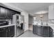 Bright kitchen featuring stainless steel refrigerator and modern finishes at 2135 N Forest Trl, Dunwoody, GA 30338