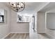 Kitchen view with stainless steel appliances, marble counters, and modern finishes at 2135 N Forest Trl, Dunwoody, GA 30338
