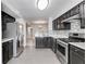 Well-equipped kitchen featuring stainless steel appliances and modern finishes at 2135 N Forest Trl, Dunwoody, GA 30338