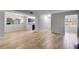 Bright living room showcasing hardwood floors, neutral walls, and open floor plan at 2135 N Forest Trl, Dunwoody, GA 30338