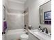Bathroom featuring a shower and tub with granite counters and decorative mirror at 6455 Quiet Cove Rd, Cumming, GA 30041