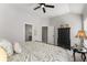 Bedroom featuring neutral tones and ample closet space at 6455 Quiet Cove Rd, Cumming, GA 30041