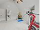 Lofted room with exercise equipment, high ceilings and natural light at 654 Crystal Cove Ct, Loganville, GA 30052