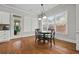 Bright breakfast nook featuring hardwood floors and natural light at 654 Crystal Cove Ct, Loganville, GA 30052