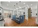 Gourmet kitchen with an island, stainless appliances, and an open floor plan at 654 Crystal Cove Ct, Loganville, GA 30052