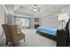 Spacious main bedroom with fireplace and sitting area at 654 Crystal Cove Ct, Loganville, GA 30052