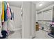 This large walk-in closet features built-in shelving and ample storage space at 654 Crystal Cove Ct, Loganville, GA 30052