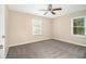 Inviting bedroom with fresh paint, new carpet, and a ceiling fan at 1997 Columbia Dr, Decatur, GA 30032