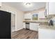 Well-lit kitchen boasting stainless steel appliances and ample counter space at 1997 Columbia Dr, Decatur, GA 30032