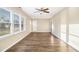 Bright living room with wood-look floors, neutral walls, and ample natural light at 1997 Columbia Dr, Decatur, GA 30032