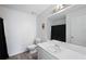 Bathroom featuring a white vanity, toilet, and shower with black curtain at 331 Cobblestone Rd, Auburn, GA 30011