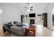 Cozy living room featuring a fireplace, neutral walls and floors, and ample natural light at 331 Cobblestone Rd, Auburn, GA 30011