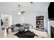 Bright living room with a fireplace, comfortable seating, and decorative accents at 331 Cobblestone Rd, Auburn, GA 30011