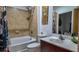 Well-lit bathroom with a shower, toilet, and a vanity at 898 Oak Sw St # 1411, Atlanta, GA 30310