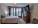 Cozy bedroom with a queen-sized bed and a large window at 898 Oak Sw St # 1411, Atlanta, GA 30310