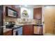 Well-equipped kitchen featuring stainless steel appliances and granite countertops at 898 Oak Sw St # 1411, Atlanta, GA 30310