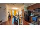 Open concept kitchen with an island and modern appliances at 898 Oak Sw St # 1411, Atlanta, GA 30310