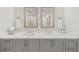 Bathroom vanity features double sinks, modern fixtures, and ample storage at 1080 Peachtree Ne St # 1902, Atlanta, GA 30309