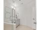 Bathroom with glass enclosed shower and modern vanity at 1080 Peachtree Ne St # 1902, Atlanta, GA 30309