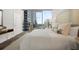 Bedroom featuring a large window with a cityscape view at 1080 Peachtree Ne St # 1902, Atlanta, GA 30309