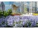 Beautiful rooftop terrace with colorful flowers and skyline views at 1080 Peachtree Ne St # 1902, Atlanta, GA 30309